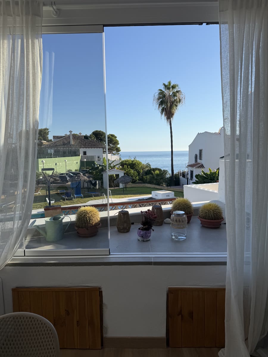 The sea view through the glass curtain